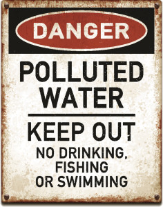 Weathered metallic placard with danger polluted water warning text_vector